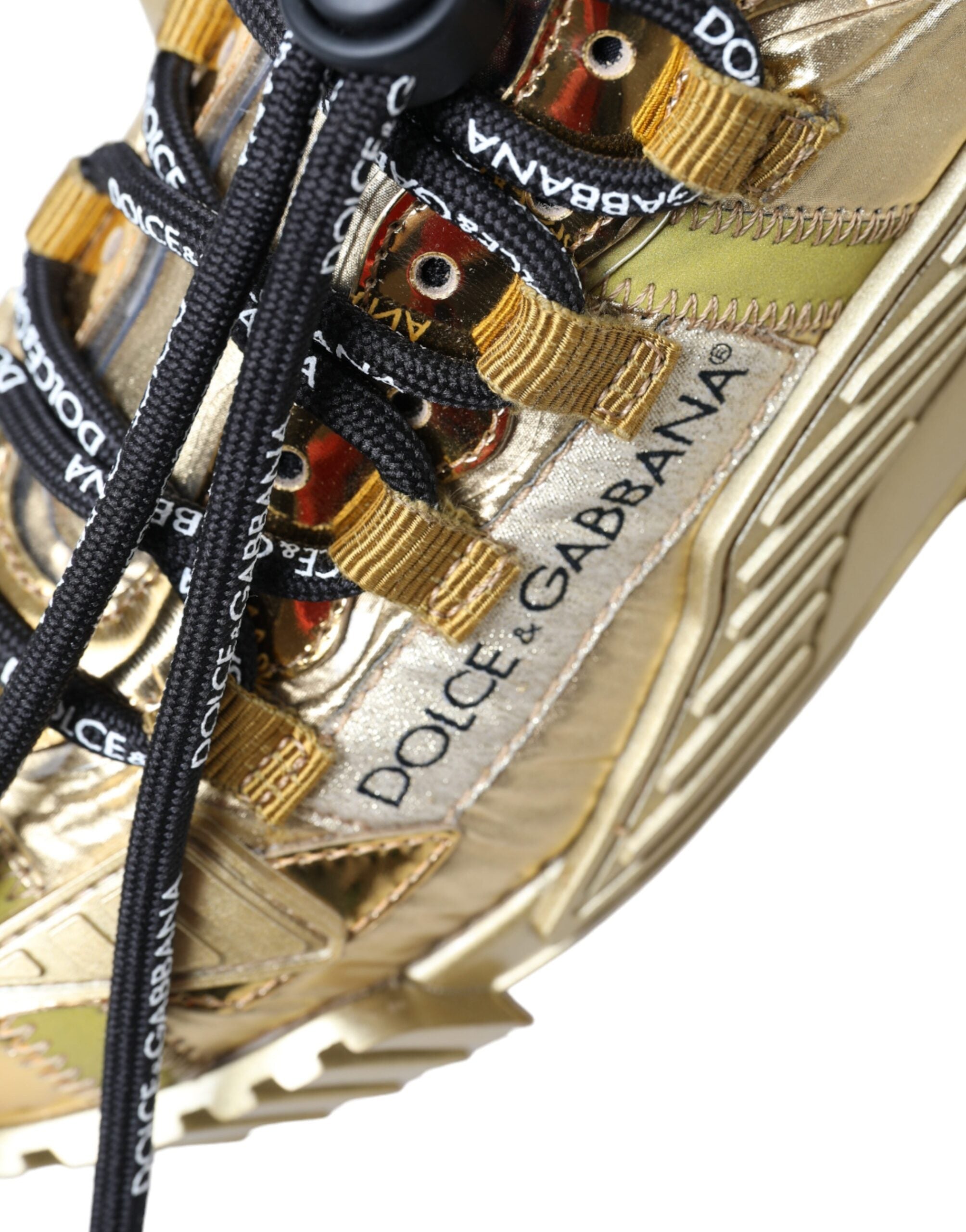 DOLCE & GABBANA
Gleaming Gold-Toned Luxury Sneakers