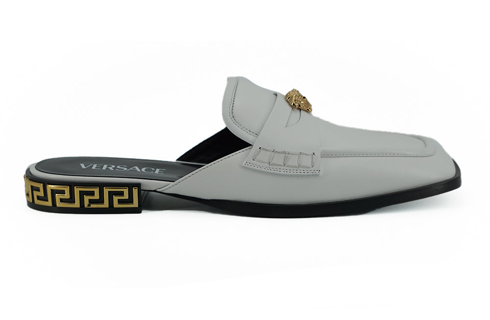 VERSACE
Elegant White Leather Flat Slides